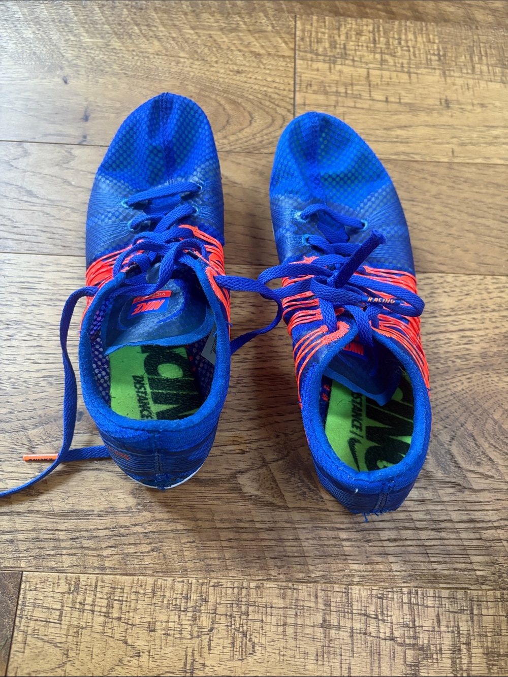 Nike Royal Blue Racing Spikes with Bright Orange Accents